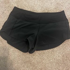 Lululemon black speed up shorts size 4 low rise 2.5 inseam